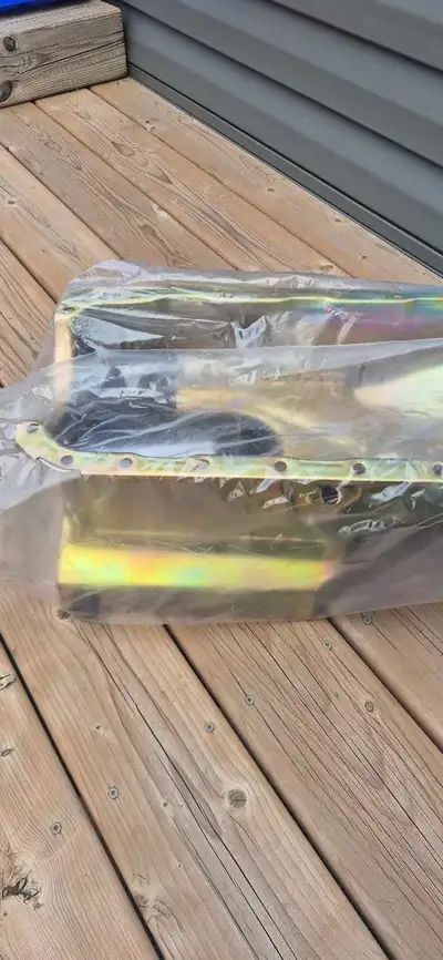 Brand new summit Racing bbc 454 oil pan ,,new in box never used,,comes with summit oil pump pick up,...