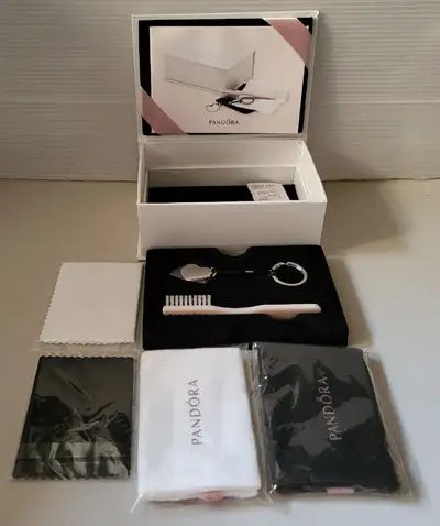 Brand New PANDORA Jewelry Care Kit in Gift Box with Clasp Opener Box contains instructions and tools...
