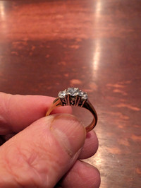 Woman's 10 Karat Gold Trinity Diamond Ring.