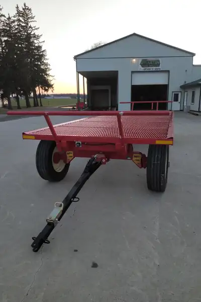 New 24ft Creekbank Mesh Hay rack with 12 ton gear with 305x22.5 used truck tires, spring tongue lift...