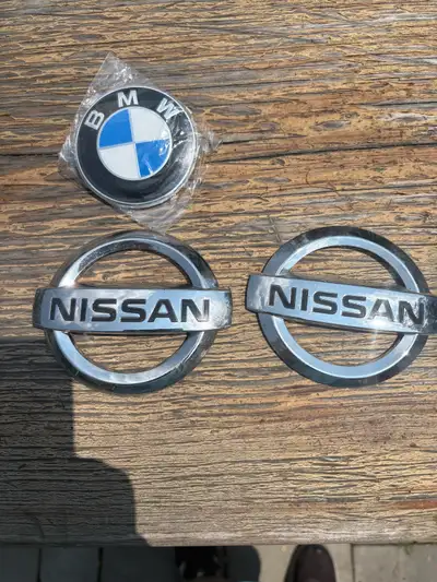 Car badge Nissan and BMW like new