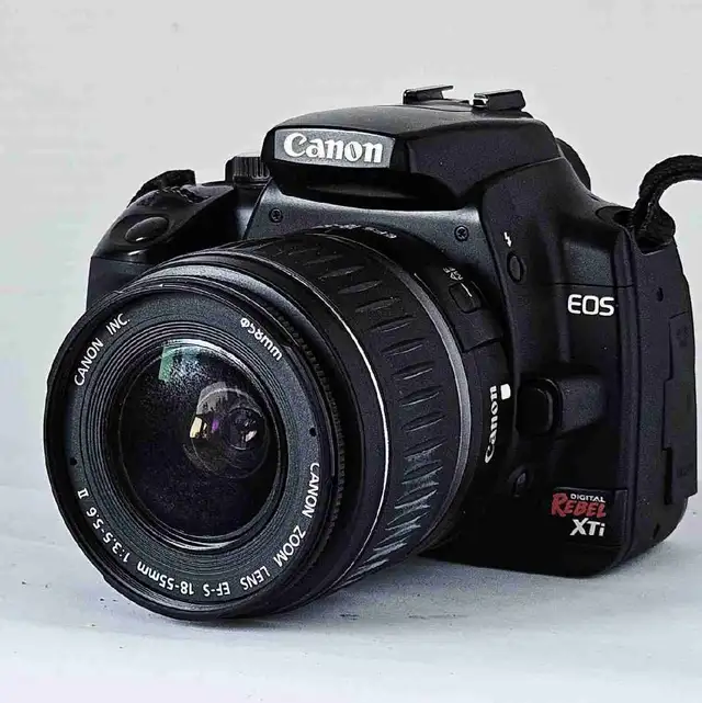 Canon EOS Digital Rebel XTi  10.1 MP DSLR Camara 18-55mm Lens 