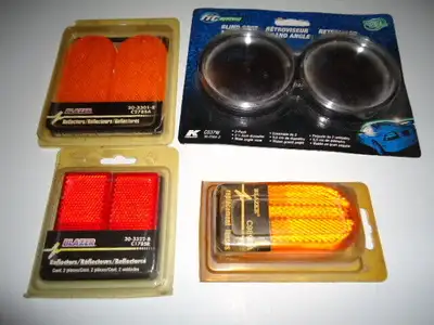 VEHICLE REFLECTIVE STICKERS, REFLECTORS, and BLIND SPOT MIRRORS. the red pack might have sold so far...