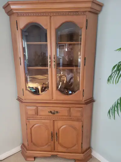 Preowned wood china cabinet for sale., View more