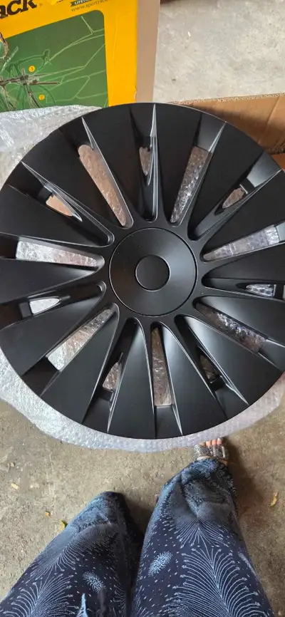 Upgrade your Tesla Model Y with these brand new KAVANIC matte black induction style wheel covers, de...