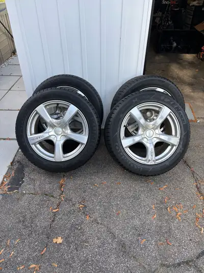 For sale: full winter wheel setup (4 rims + 4 tires) – ready to bolt on. WHEELS: • Touren 5-spoke al...