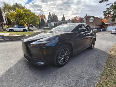 Step into the future of luxury driving with this 2023 Lexus RZ 450e Executive Package — a fully load...