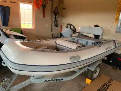 Highfield Inflatable. In excellent condition as seldom used. Includes Seat/Console, depth finder, cu...