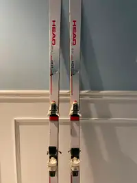 185cm Head radial skis with Salomon bindings fair to good cond.