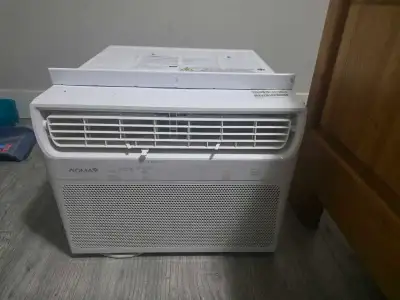 This is a used NOMA 10,000 BTU window air conditioner, perfect for cooling a medium-sized room quick...