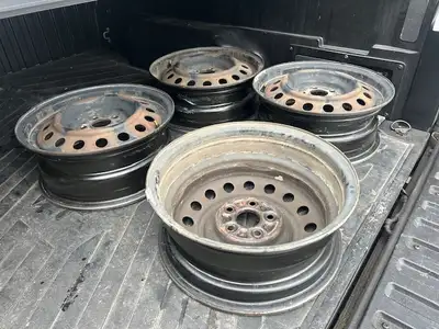 Four 15 inches Steel Rims , 5 Lugs, 5x100mm bolt, center bore 54.1mm. Came off a 2008 Toyota Corolla...