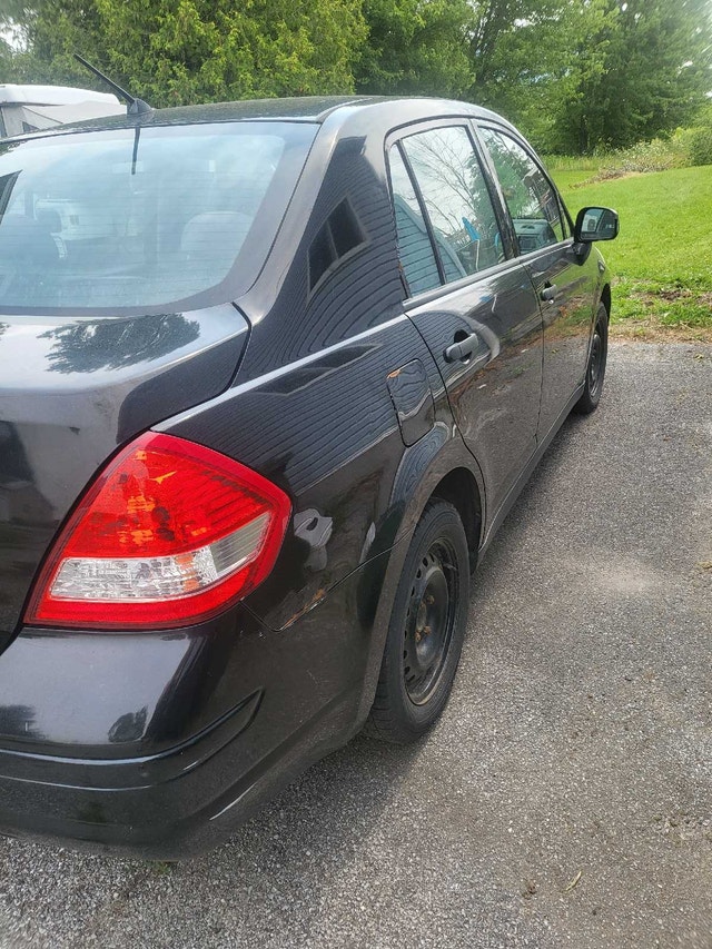 Nissan versa 2009 — photo 2