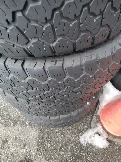 4 tires ten ply all terrain. Just above wear bars 275 70 18 ten ply good year still wear left want g...