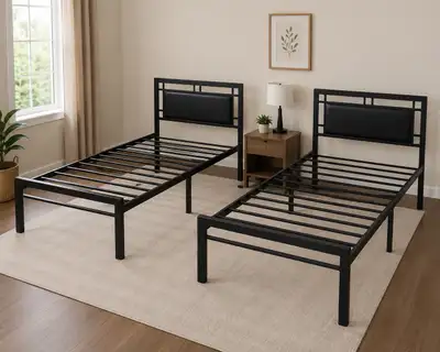 Two matching black metal double bed frames , View more