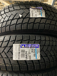 One pair new  205 55 16 Michilen X-ice & snow winter tires $400 
