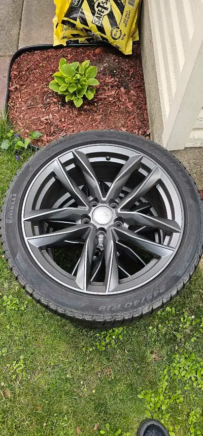 Pirelli winter tires on Audi rims, only used one winter, came off my 2012 S5 but fits many models. 2...