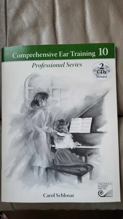 Carol Schlosar comprehensive Ear Training 10 with 2 CDs Never used. Accidentally bought 2 same books...