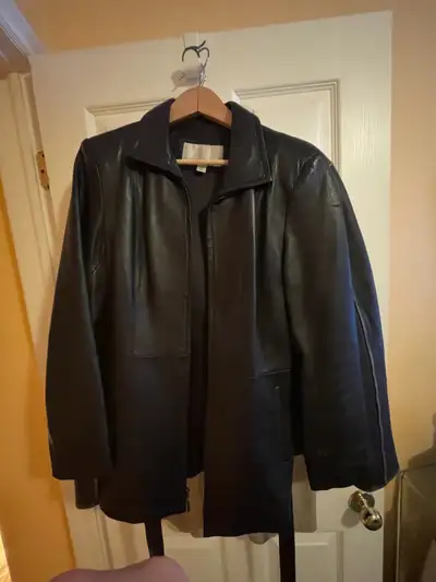 Nine West Burberry men’s and ladies coats Please text 9024880374