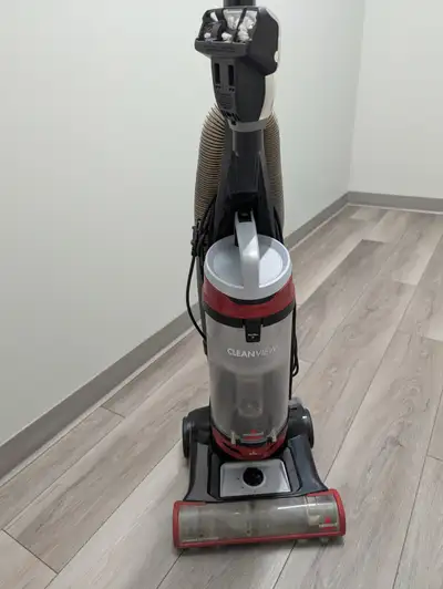 Bissell Cleanview vacuum cleaner with powered spin brush attachment. Good for carpets or homes with...