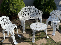 Cast iron patio bench and chairs, table is cast aluminum