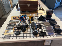 Canon AE-1 camera + asst equipment 