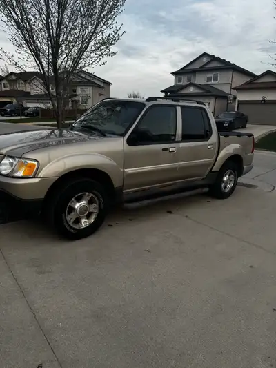 Selling my 2004 Ford Explorer Sport Trac XLT. Car runs great - 4 wheel drive. Please review the phot...