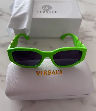 Men’s swimming shorts Large and Sunglasses Versace, View more