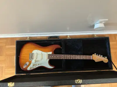 Used Fender Elite Strat in very good condition. There’s at least one dent (my bad), so it’s not pris...