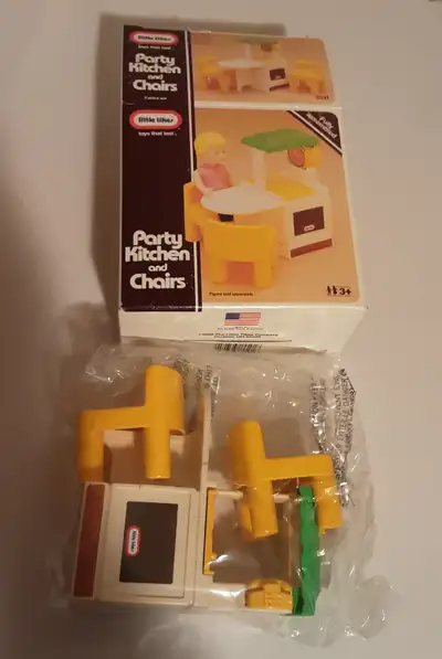 Has attached land line phone. Vintage New in Box and never played, sealed to the date of photos, onl...
