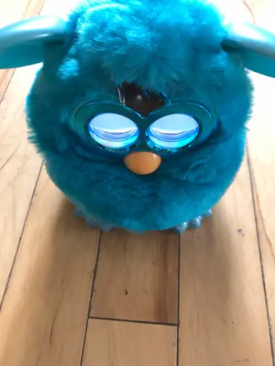 Furby toy Takes AA batteries. Excellent condition. Asking $10