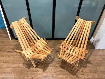 2 Hand crafted folding wooden lounge chairs made in BC. Price is for both.