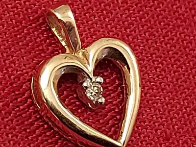 Yellow gold genuine diamond pendant 10K . ..Pickup only, View more