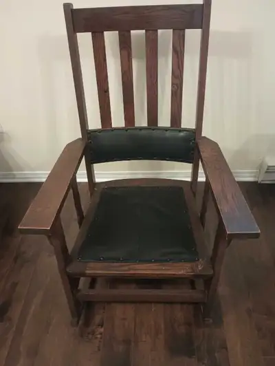 Antique mission style rocking chair, approximately 1910, original leather on back, seat leather repl...