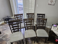6 dinning room chairs  with  chair covers