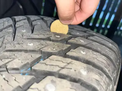 Selling four Nokian studded tires (rimless), size 225/50 R18, purchased from Kal Tire in December 20...