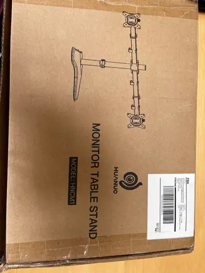 Monitor stand Brand HUANUO Model HNCM1 brand new.