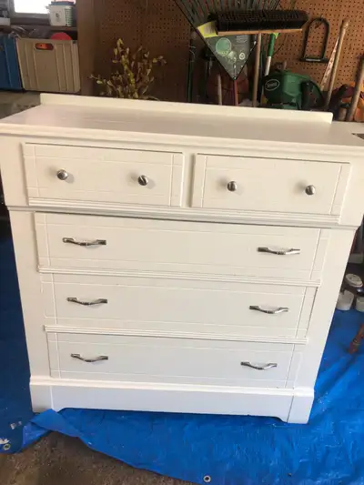 Antique dresser recently painted. 5 Drawers.. Solid wood with dovetails. Drawers open and close easi...