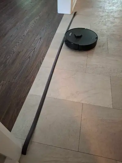 One strip is 13 ft long. The other is 6ft 6". We used them with our Neato Robot vacuum. I can't guar...