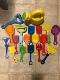 Group of 21 -  KIDS BEACH SHOVELS , RAKES , PAILS , etc…