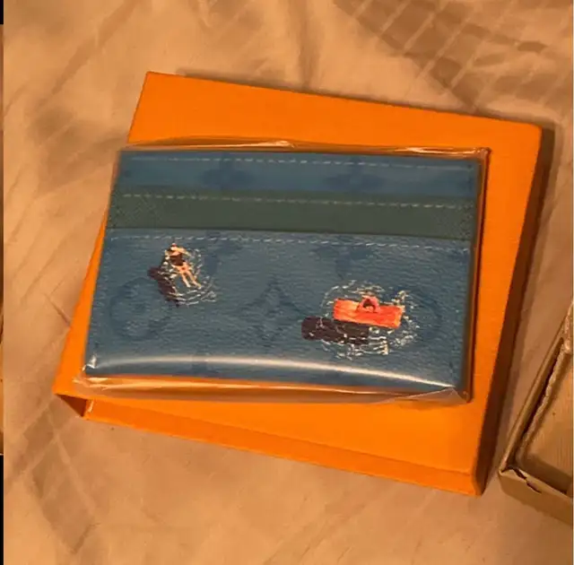 Designer wallet549315370948372482