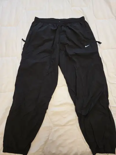 Nike mens XL black trackpants, View more