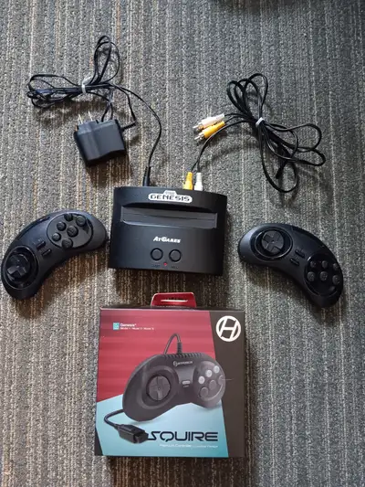 AtGames SEGA mini console with 2 wireless controllers, pre loaded games and we also purchased an add...