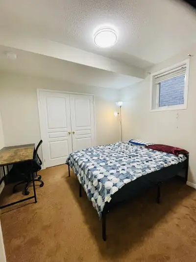 - Bright and spacious furnished raised-basement private room with shared laundry, washroom and full...