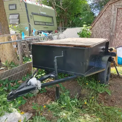 Smaller, Good solid, Black utility trailer...made of metal, tires good! I bought the trailer in BC i...