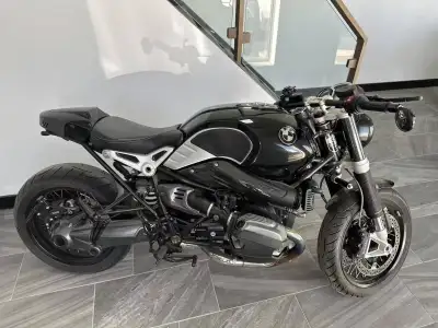 Ready to ride in style? This beautifully maintained 2015 BMW R nine T Café Racer is up for grabs! ✔️...