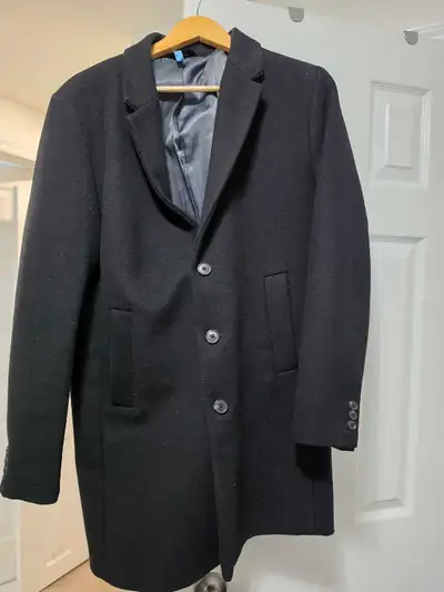 I'm selling a stylish black men's trench coat, perfect for those chilly days! This coat is in good c...