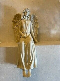 Angel Sitting with full wings
