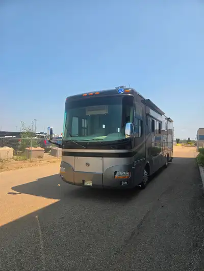 2007 Holiday Rambler Ambassador 38 pdq Class A diesel motorhome with four slides. Very good conditio...