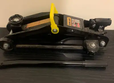 Used 1 time. Car Jack and crank bar. Asking $50 firm.
