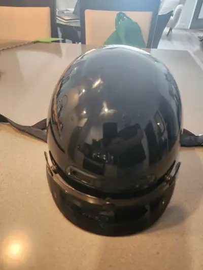 This MHR motorcycle helmet is a size XS and is DOT approved, offering a classic open-face design for...